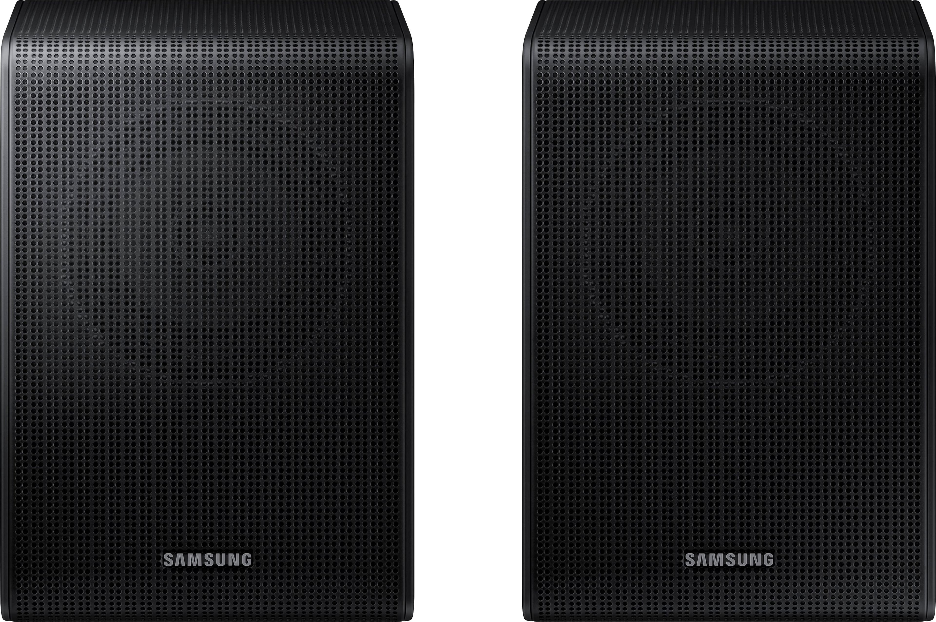 Installing Samsung Wireless Rear Speaker Kit Black Home Theater Audio on a wooden desk